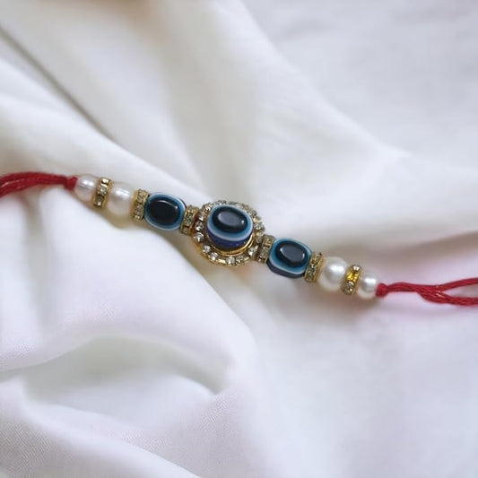 PujaSamadhaan Evil Eye Rakhi Combo: Brass Chain Rakhi & Mauli Rakhi. Ideal Rakhi Gift for Siblings - Brother, Sister, Bhai/Bhaiya. Divine Protection for Raksha Bandhan.